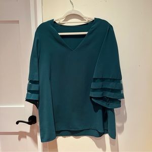 Turquoise green v-neck top with mesh sleeve detail size XL